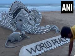 
      
      Sand artist Sudarsan Pattnaik sculpts Lord Ganesha on beach 
      
      