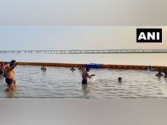 
      
      UP: Devotees take holy dip in Sangam on Ganesh Chaturthi
      
      
