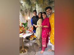 
      
      Sara poses with Kartik at his Ganesh Chaturthi celebrations
      
      