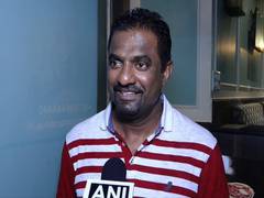 
      
      Muttiah Muralitharan plays cricket in Mumbai rains
      
      