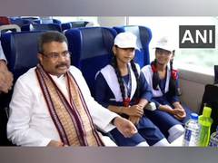 
      
      Dharmendra Pradhan interacts with students on-board Vande Bharat
      
      