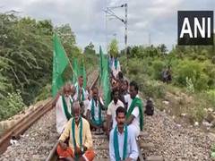 
      
      Tamil Nadu: Farmer association stage protest on railway track 
      
      