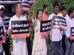 
      
      BJP workers hold protest against CM Arvind Kejriwal in Delhi
      
      