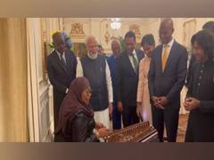 
      
      Tanzanian Prez tries Santoor with PM Modi's encouragement
      
      