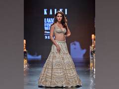 
      
      Disha Patani stuns in pastel lehenga at Lakme Fashion Week 2023
      
      