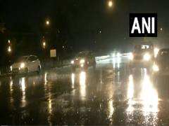 
      
      Rain lashes parts of Delhi, mercury drops
      
      