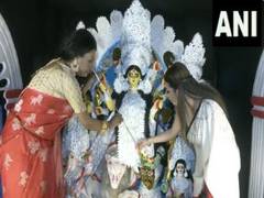 
      
      Transgender community seen decorating Durga puja pandal
      
      