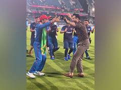 
      
      Irfan Pathan dances with Rashid Khan to fulfill his promise
      
      