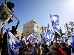 
      
      Dozens of residents of Kfar Aza hold rally in Tel Aviv
      
      