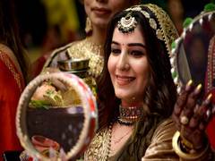 
      
      Karwa Chauth: Moon shines bright; women end fast 
      
      