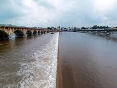 
      
      Vaigai river floods after water released from Vaigai dam
      
      
