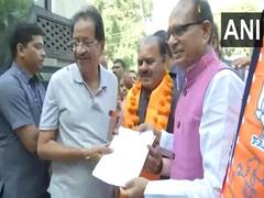 
      
      MP CM Chouhan distributes voter slip to residents in Bhopal
      
      