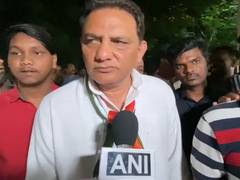 
      
      Mohammad Azharuddin watches CWC final match at screening 
      
      
