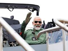 
      
      PM Modi Takes sortie on Tejas fighter aircraft in Bengaluru
      
      