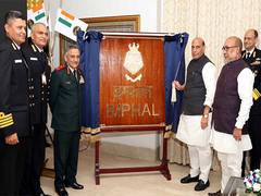 
      
      Defence Minister Rajnath Singh unveils crest of INS Imphal
      
      