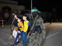 
      
      Teen siblings freed from Hamas captivity face mother's murder
      
      