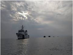 
      
      Indian Navy, Coast Guard vessels moving towards merchant ship
      
      