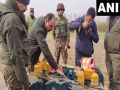 
      
      J-K police recover arms, IEDs from drone-dropped package near LOC
      
      