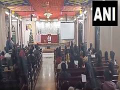 
      
      People offer mid-night prayers on occasion of Christmas
      
      