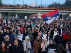 
      
      Serbia police fire tear gas as protesters storm streets 
      
      