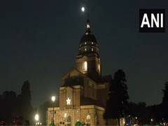 
      
      Delhi: Churches lit up, people gather to offer prayers 
      
      