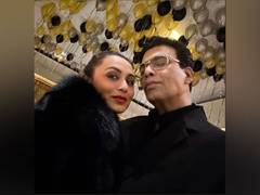 
      
      Karan Johar, Rani Mukerji twin in black at New Year bash
      
      