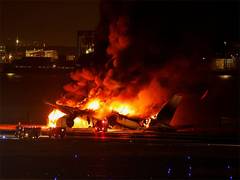 
      
      Japan airlines jet on fire; 379 evacuated safely
      
      