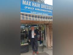 
      
      Australian envoy Philip Green gets his beard trimmed in Delhi
      
      
