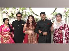 
      
      Aamir poses with newlyweds Ira, Nupur at wedding reception
      
      