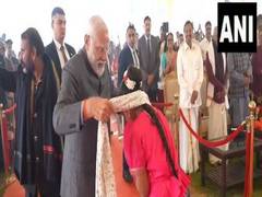 
      
      PM Modi gifts his shawl to girl during Pongal celebrations
      
      