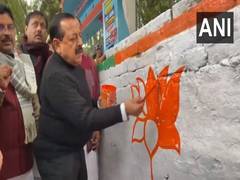 
      
      Jitendra Singh paints lotus symbol at Mainpuri
      
      