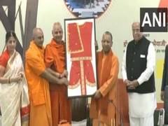 
      
      UP CM participates in programme of offering clothes for Lord Ram
      
      