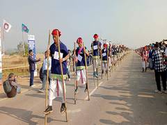
      
      Assam: 721 Karbi men set new stilt-walking world record 
      
      