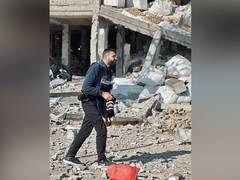 
      
      Palestinian photojournalist Motaz Azaiza evacuates Gaza
      
      