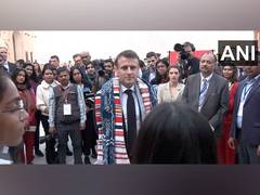 
      
      French President Emmanuel Macron interacts with students at Amber
      
      