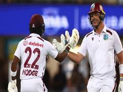 
      
      Hodge, Joshua's record stand pulls West Indies out of misery 
      
      