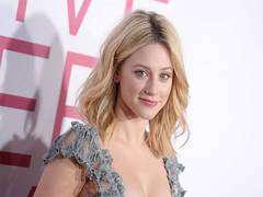 
      
      Lili Reinhart is 