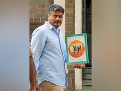 
      
      Rohit Pawar reaches ED office
      
      