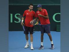 
      
      Krajicek, Ram help USA secure spot in Davis Cup Finals
      
      