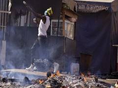 
      
      Protesters clash after elections postponed in Senegal
      
      