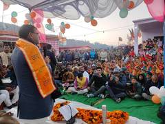
      
      Uttarakhand CM Dhami interacts with villagers during campaign
      
      