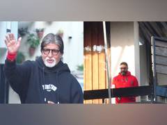 
      
      Sunday Darshan: Amitabh Bachchan waves to fans with Junior B
      
      