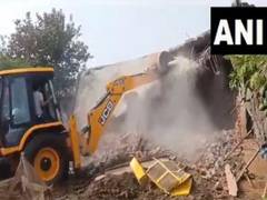 
      
      District administration demolishes illegal structure of accused
      
      