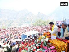 
      
      CM Dhami participate in road show organized under 