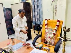
      
      Govt college principal places picture of Lord Ram on his chair
      
      