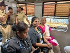 
      
      Nirmala Sitharaman takes Mumbai's local train; click selfies with
      
      