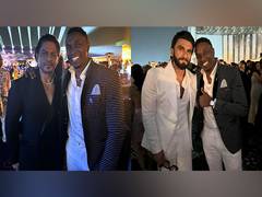 
      
      SRK, Ranveer pose with Dwayne Bravo at Anant's pre-wedding bash
      
      