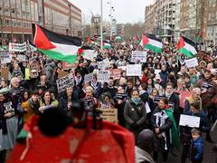 
      
      Protestors condemn Israeli President's presence at National Holoc
      
      