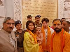 
      
      Priyanka, Nick offer prayers at Ram Mandir with daughter Malti 
      
      