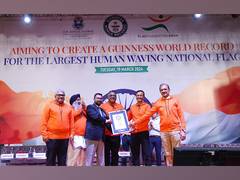
      
      New Guinness World Record for Largest Human Waving National Flag 
      
      